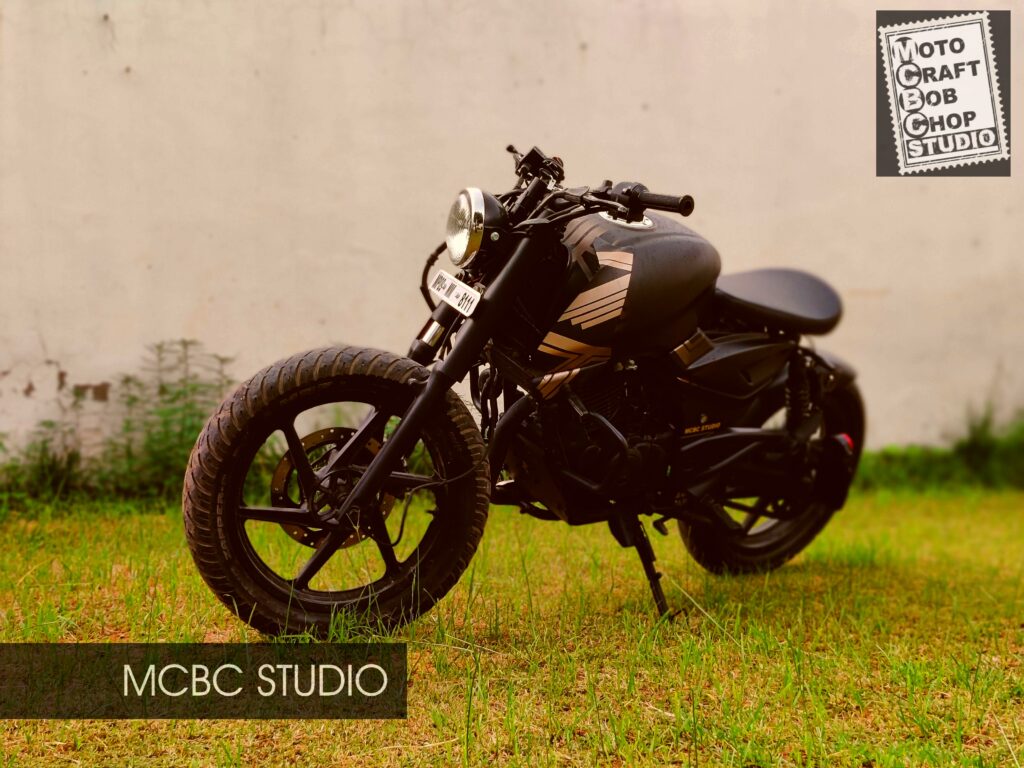 MCBC Studio custom modified motorcycle Bajaj Pulsar bobber Bajaj Pulsar modified into a single seater bobber with an intricate Black-Gold paintjob