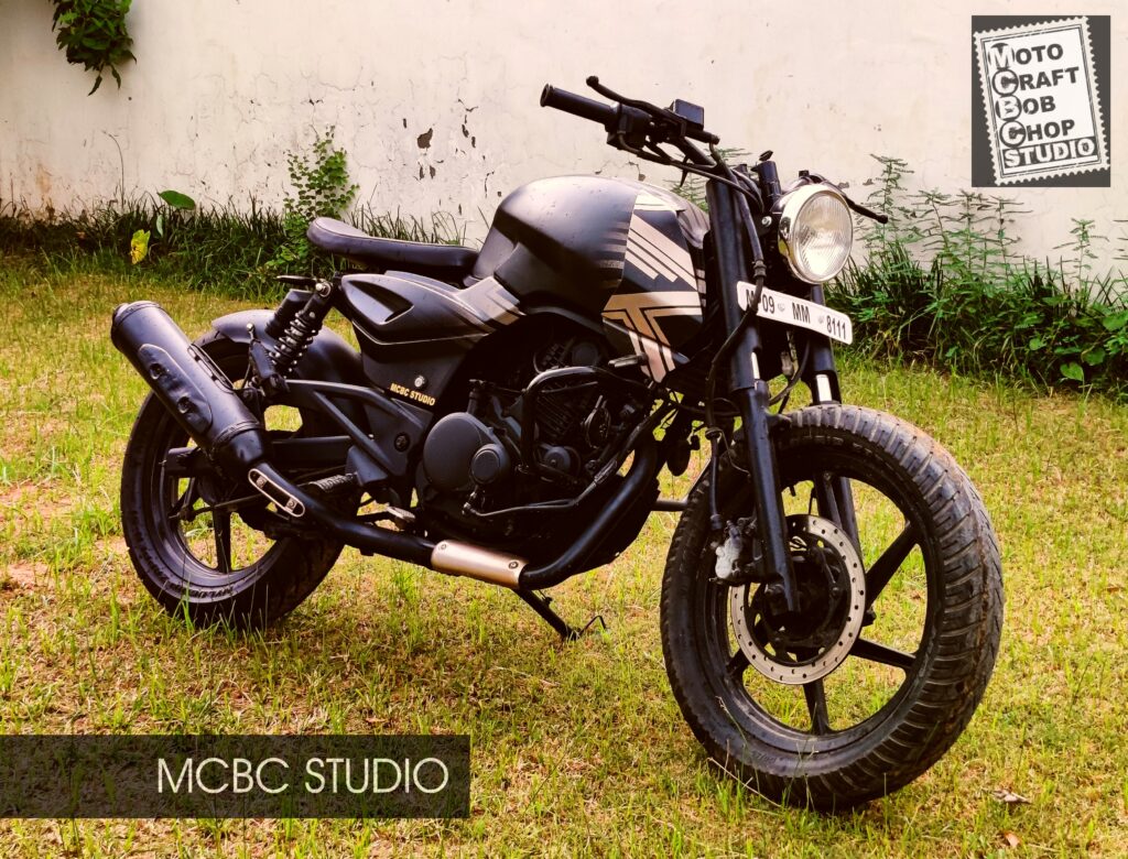 MCBC Studio custom modified motorcycle Bajaj Pulsar bobber Bajaj Pulsar modified into a single seater bobber with an intricate Black-Gold paintjob